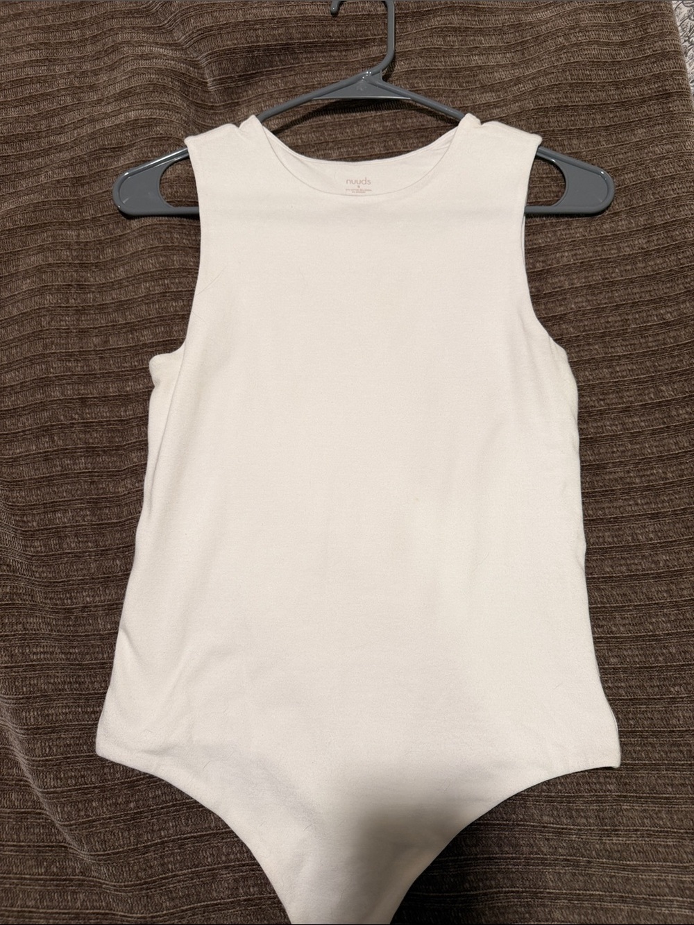NUUDS Sleeveless White Bodysuit